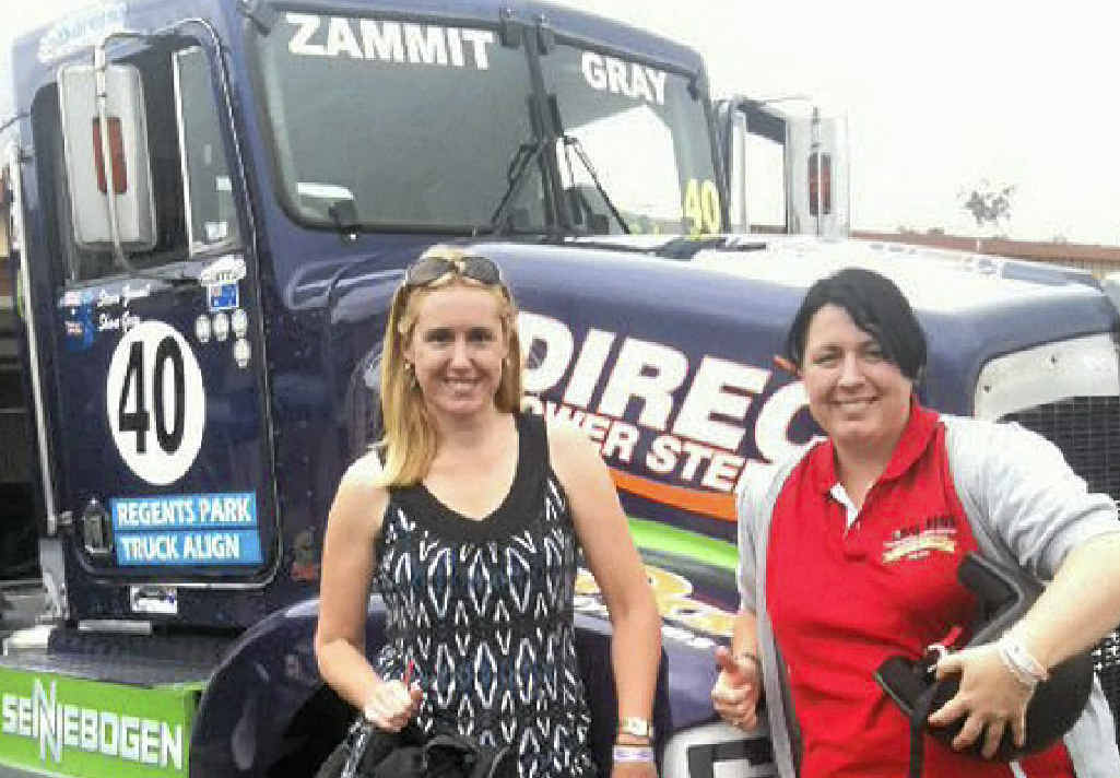 READY TO RIDE: Hotlap competition winner Melissa Nonnenma and Big Rigs editor Carly Morrissey get ready for their turn in a racing truck. READY TO RIDE: Hotlap competition winner Melissa Nonnenma and Big Rigs editor Carly Morrissey get ready for their turn in a racing truck.